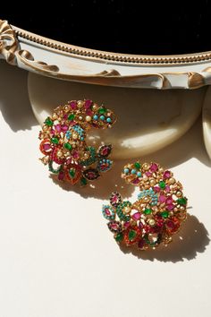 Tina Navratan Statement Top Earrings with vibrant multicolor stones and gold-tone Elegant Multicolor Hoop Earrings For Party, Multicolor Fusion Gold-plated Jewelry, Multicolor Fusion Style Gold Plated Jewelry, Multicolor Fusion Gold Plated Jewelry, Multicolor Gold Plated Fusion Jewelry, Elegant Multicolor Pearl Earrings For Celebration, Multicolor Jewelry With Intricate Design For Party, Elegant Multicolor Flower Earrings For Parties, Bohemian Earrings With Peacock Design For Celebrations