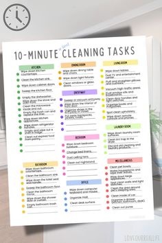 the 10 minute cleaning tasks poster is hanging up in front of a white wall with a clock