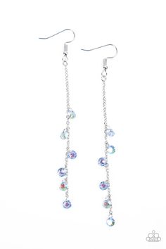 Featuring stellar iridescence, a dainty collection of glassy blue rhinestones tumble down a lengthened silver chain for a twinkly tasseled look. Earring attaches to a standard fishhook fitting.

 Sold as one pair of earrings. Long Silver Earrings, Jewelry Images, Paparazzi Accessories, Blue Jewelry, Colourful Necklace, Affordable Jewelry, Paparazzi Jewelry, Pink Earrings, Pink Rhinestones