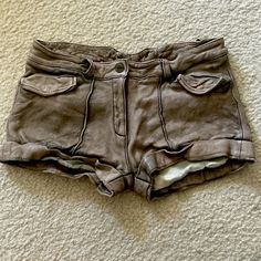 Amazing Doma Leather Short Shorts. Bought Online From Free People Nearly 16 Years Ago!They Are In Perfect Condition. I Never Wore Them And They Are Very Hard To Find Now! Leather Is Supple And So Soft! Features 2 Snap Closure Flap Pockets At The Front. 2 Back Pockets, Rolled Cuffs And Exposed Seams Throughout. Button And Zip Fly. Color Is Amazing A Nice Chocolate Brown That Has A Natural Distressed Look. Tag Inside Reads “This Garment Is Made From A Natural Product. Markings Or Shadings In Surfa Soft Features, Exposed Seams, Leather Short, Leather Cleaning, Mini Shorts, Leather Shorts, Short Shorts, Leather Mini, Vintage Brown