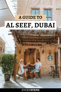 two people sitting at a table in front of a building with text overlay reading a guide to al seef, dubai