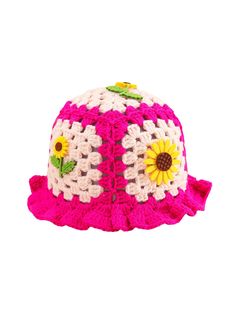 a pink crocheted hat with sunflowers on it