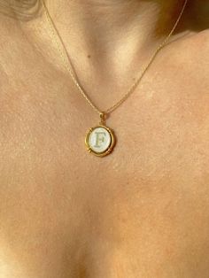 "CUSTOM INITIAL ON MOTHER OF PEARL NECKLACE You can order with the initial letter you want on mother-of-pearl. Material: 925 Sterling Silver, Mother of Pearl Color options: Silver, Gold, Rose Gold Necklace measurements: 16\" with a 2\" extender, for a total adjustable length of 18\". (40+5 cm) Written in uppercase letters only! Please use the 'PERSONALIZATION BOX' to let us know the word or sentence that you would like. Material: High Quality Solid 925 Sterling Silver Finish: Sterling Silver, Go Custom Initial Necklace, Mother Of Pearl Necklace, Custom Name Necklace, Custom Initials, Initial Pendant, Letter Necklace, Personalized Initials, Gold Plated Necklace, Perfect Gift For Her