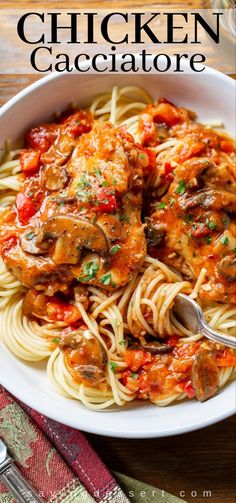 chicken cacciatore with spaghetti in a white bowl