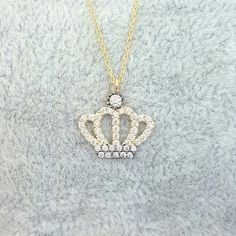 - Queen Crown Princess women jewelry necklace is made with high quality 14K real solid gold and as decorated with white zirconia stones - This charm, dainty, delicate and trendy the women jewelry pendant necklace has been artfully designed for timeless yet modern millennial fashion. - You receive the necklace in a beautiful and free gift box. - Free shipping (Arrive within 4 business days to USA and Canada ( 1 day for production+3 days for shipment)) - This necklace is a perfect and special gift Cubic Zirconia Jewelry For Christmas Anniversary, Christmas Anniversary Jewelry With Cubic Zirconia, Sterling Silver Diamond Necklace With Accents For Celebration, Christmas Anniversary Cubic Zirconia Jewelry, Silver Cubic Zirconia Necklaces For Christmas, Cubic Zirconia Necklaces With Diamond Accents For Celebration, Christmas Silver Cubic Zirconia Necklace, Personalized White Diamond Necklace As A Gift, Personalized White Diamond Necklace As Gift