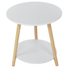 a white round table with wooden legs