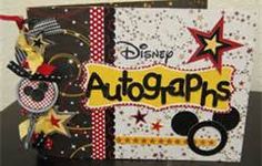 an autographs card with mickey mouse ears and stars on it, sitting on top of a table