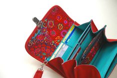 "A beautiful and elegant travel passport wallet clutch for all things well organized: phone, cash, coins, bills and cards made by MrAndMrsWallet. This red wallet wristlet can be a great gift idea for a special person in your life. And it is very roomy and easy to use. Optional wristlet adds to its functionality. A special pocket to hold small and big phones like iPhone 10 or Galaxy Note 8... I used sturdy red upholstery fabric on the exterior body of the wallet. Edges are reinforced with red pip Red Travel Wallet With Cell Phone Pocket, Red Clutch Wallet For Travel, Red Rectangular Clutch With Interior Card Slots, Rectangular Red Clutch With Interior Card Slots, Red Travel Bag With Card Slots, Red Travel Wallets With Removable Pouch, Red Travel Clutch With Interior Card Slots, Red Travel Wallet With Removable Pouch, Red Clutch Wallet With Cell Phone Pocket