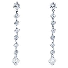 Alex Jona elegant and essential diamond earrings featuring 14 beautiful, G color, VVS1 clarity, diamonds of different shapes, weighing 2.24+0.27 carats, pierced and purely assembled by platinum links, made in Italy. Dimensions: H 1.37 in x W 0.19 in x D 0.1 in - H 35 mm x W 5 mm X D 3 mm. Alex Jona jewels stand out, not only for their special design and for the excellent quality of the gemstones, but also for the careful attention given to details during all the manufacturing process. Alex's pas White Gold Drop Earrings, Yellow Gold Drop Earrings, Crystal White, Diamond Drop Earrings, Diamond Drops, Antique Diamond, Gold Drop Earrings, Rock Crystal, Special Design