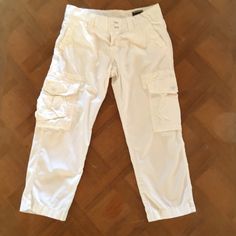 Nwot Mason's Women's Cargo Capri Pant -Color = Solid White -Size = Women's / Italian 42 -Fit = Cargo-Style. Capri Length. Button-Zipper Closure. Rear Flap Pockets With Snap Closure. White Eyelet Detail Around The Interior Waist Band. Side Pockets On Both Legs. Designed & Made In Italy. -Content = 100% Cotton -Condition = Nwot. Measurements (Approx.): -Rise = 9" -Inseam = 23" Cargo Style, Women Cargos, White Eyelet, Waist Band, Snap Closure, Pant Jumpsuit, Capri Pants, Capri, In Italy