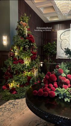 a christmas tree in the middle of a room