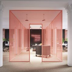 an office with pink partitions in the middle