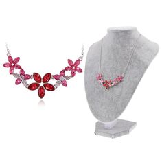 The Anna-Kaci Women's Floral Crystal Statement Necklace with Rhinestone Accents is a stunning piece designed for fashion-forward outfits and special occasions. This elegant necklace features a captivating floral design adorned with sparkling rhinestone accents, adding a touch of glamour and sophistication to any ensemble. The adjustable chain ensures a perfect fit for any neckline, making it versatile and easy to wear. Ideal for weddings, parties, or elevating your everyday style, this statement Red Crystal Necklace With Jewels, Red Crystal Necklaces With Jewels, Red Rhinestone Necklace For Gift, Red Crystal Necklace For Valentine's Day, Red Rhinestone Necklaces For Gifts, Red Crystal Necklace For Gift, Date Night Gifts, Fuchsia Flower, Two Flowers