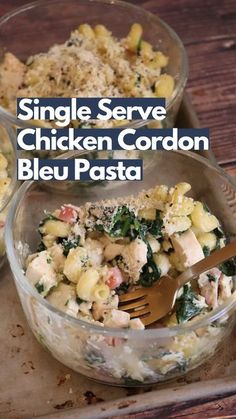 two bowls filled with chicken and pasta on top of a wooden table next to a fork