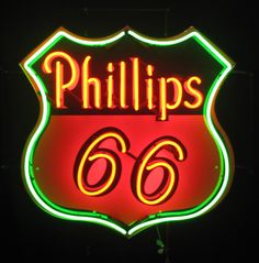 a neon sign that reads phillips's 66