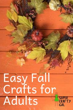 an easy fall craft for adults to make with leaves and acorns on a wooden background