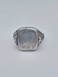 Beautiful antique signet ring made of 835 silver Very difficult Ring shoulders florally designed Initials HW Size 23 63 Ring head 1.9cm x 1.5cm material 835 silver A beautiful antique piece of jewelry Always sent with tracking Classic Silver Signet Ring With Maker's Mark, Antique Stamped Signet Ring For Formal Occasions, Vintage Formal Initial Ring, Antique Engraved Sterling Silver Signet Ring, Vintage Stamped Signet Ring For Formal Occasions, Vintage Formal Stamped Signet Ring, Antique Sterling Silver Engraved Signet Ring, Antique Hallmarked White Gold Signet Ring, Vintage Silver Signet Ring With Engraving Option