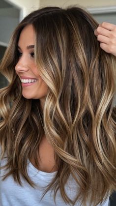 Discover stunning bronde hairstyle ideas, including balayage, balayage brunettes, mushroom, balayage hair, balayage on dark hair, caramel, low maintenance, balayage with money piece, 10 méches pour cheveux bruns, nous rajeunir, spring hair colors, spring hair colors for brunettes, cozy fall hair color ideas, fall hair color ideas, stylish season, pecan sandie, boston cream pie, bombshell hair color ideas, summer hair color ideas, best 2023 haircut, best 2023 hair color, zodiac sign hair color... Long Hair Caramel Balayage, Brown Caramel Hair Balayage, Butterscotch Highlights On Dark Hair, Long Hair Going Out Hairstyles, Balayage Hair Low Maintenance, Bronde Caramel Balayage, Balayage Hair Brown Caramel, Low Maintenance Fall Hair, Caramel Money Piece Hair On Dark Hair