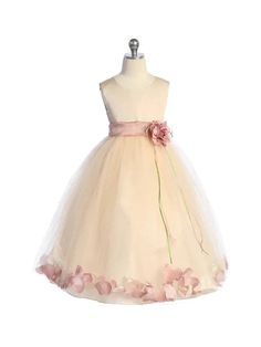 Introducing the Girls Blush Multi Color Satin Top Petal Flower Girl Dress 2-14, a truly enchanting ensemble that will make your little girl feel like a princess. Created by Kids Dream, this dress is a testament to elegance and sophistication. The satin bodice exudes grace, while the delicate floating flower petals inside the skirt add a touch of whimsy. To complete the look, a matching 3D floral adornment sits gracefully on the dress. Designed to captivate, this beautiful dress is perfect for any special occasion. The soft and feminine blush color of this dress adds a charming allure that is hard to resist. The meticulous attention to detail in the design is evident, showcasing the craftsmanship and artistry that went into its creation. Your sweet girl will shine as she twirls and dances i Spring Princess Style Cream Dress, Spring Princess Dress For First Communion, Pink Dress For First Communion In Spring, Princess Style Cream Tutu Dress For Spring, Pink Dress For Spring First Communion, Pink Spring Dress For First Communion, Pink Tutu Dress For First Communion In Spring, Spring Princess Cream Dress, Spring Cream Sleeveless Tutu Dress