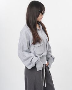 This grey zip-up sweatshirt features a cropped fit and big grey pockets in front. The very sweatshirt that Lisa from Blackpink wore in her special 27th Birthday vlog! To complete the outfit, also check out the purple socks with a cat design that Lisa wore in the video﻿ Size:• S: Bust: 102cm/ 40.1 in, Length: 51cm/ 20.0 in • M: Bust: 104cm/ 40.9 in, Length: 52cm/ 20.5 in • L: Bust: 106cm/ 41.7 in, Length: 53cm/ 20.8 in Material: Polyester Casual Gray Hoodie With Zipper Closure, Gray Zipper Sweatshirt, Grey Sweater Zip Up, Gray Hoodie With Zipper Closure, Summer Y2k Outfits, Retro Summer Outfits, Kawaii Shorts, Grey Cropped Hoodie, Purple Socks