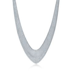 The form is malleable and ergonomic in the way it drapes over the body's contours. Bib necklace in sterling silver. Size small, 26.5" long. Ties to variable lengths. Original designs copyrighted by Elsa Peretti | Elsa Peretti® Mesh Bib Necklace in Sterling Silver, Small Tiffany Necklaces, Drop Necklaces, Diamond Drop Necklace, Pendants For Women, Tiffany Necklace, Expensive Jewelry Luxury, Heart Pendants, A Million Dollars, Tiffany Jewelry