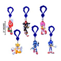 sonic the hedgehog keychains are shown in different colors and sizes, including red, white, blue, and yellow