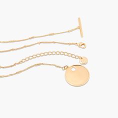 Meet your new layered look, no maintenance necessary. Our Grace Layering set is a stylish mix of a sleek and simple chain choker with an engravable pendant necklace. Each piece works on its own but creates quite the statement when worn in tandem. Available in 14k gold plated, rhodium plated or 14k rose gold plated brass Grace Toggle Necklace: Size: 7/8"; Length: 18" curb barrel chain Madeline Necklace: Size: 1mm; Length: 16" satellite chain with 2" extender With engraving this item is FINAL SALE Elegant Double Chain Charm Necklace With Round Pendant, Elegant Round Pendant Charm Necklace With Double Chain, Minimalist Rose Gold Chain Necklace For Layering, Minimalist Rose Gold Layered Necklace With Adjustable Chain, Minimalist Rose Gold Necklace With Double Chain, Minimalist Rose Gold Double Chain Necklace, Minimalist Rose Gold Double Chain Jewelry, Minimalist Gold-tone Double Chain Necklace, Minimalist Gold-tone Layered Necklace