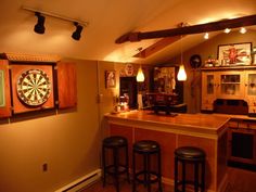 a home bar with darts on the wall