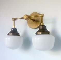 two light fixtures mounted on the wall