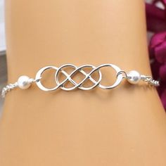 Mother of the Bride Gift Sterling Silver Double Infinity | Etsy Elegant Silver Bracelets For Anniversary Gift, Adjustable Infinity Jewelry For Bridesmaid Gift, Adjustable White Infinity Jewelry, Adjustable Hypoallergenic Wedding Jewelry, Personalized Infinity Bracelets For Wedding, Elegant Customizable Bracelets For Wedding, Customizable Elegant Wedding Bracelets, Elegant Adjustable Jewelry For Anniversary Gift, Elegant Customizable Wedding Bracelets