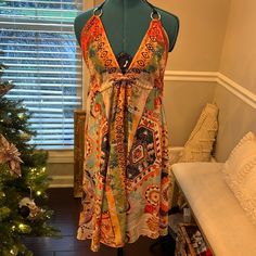 Never Worn, Bought From Jamaica. Has Silver Rhinestones On The Dress And Is More Of A Midi Dress. Bohemian V-neck Mini Dress For Holiday, Vibrant Print Knee-length Beach Dresses, Colorful Pattern Sleeveless Midi Dress For Vacation, Colorful Sleeveless Midi Dress For Vacation, Bohemian Sundress With Colorful Pattern For Beach, Colorful Patterned Sundress, Printed Sundress For Holiday, Bohemian Mini Length Holiday Dresses, Bohemian Sundress With Colorful Pattern