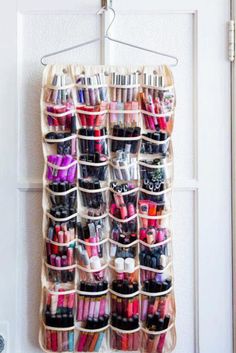 an over the door hanging organizer with lots of lipstick