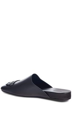 These black Balenciaga BB logo leather slipper shoes feature a square toe, slip-on design, flat sole and BB logo plaque.Calfskin leather with leather soleRubber tap heelMatte black-tone BB logo detail Composition: Leather 100%Lining Composition: Leather 100%Sole Composition: Leather 100% Fits true to sizeMade in Italy Shoes Runway, Chevron Jewelry, Bb Logo, Black Balenciaga, Gucci Shop, Balenciaga Black, Shoes Flats Sandals, Luxury Women Fashion, Leather Slippers