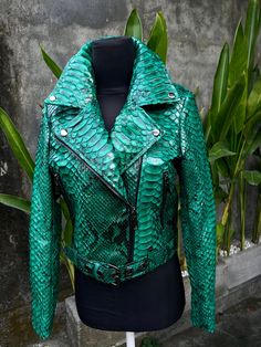 Emerald  KING PYTHON LEATHER Jacket   PREMIUM QUALITY LUXURY STYLE Outside: GENUINE GLOSSY PYTHON LEATHER  Accessories: silver color (please see the photo). All our products are 100% handmade, we always try to create interesting ideas to make your style unique. We use only the highest quality materials and accessories from around the world and only best leather from Indonesia. Before listing each new model undergoes different quality and usability tests at every stage of production. Every single Snakeskin Jacket, Pink Peacoat, Timeless Bags, Green Leather Jackets, Womens Biker Jacket, Best Leather, Accessories Silver, Interesting Ideas, Leather Biker Jacket