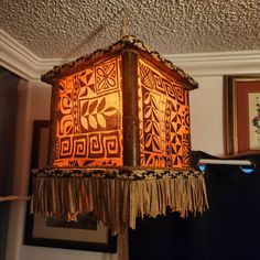 Beautiful one of a kind deluxe Tiki Lamp! Great accent light to light up any room! Hangs from a manufactured 16 ft jute cord that will allow for many hanging options! On and off switch at the plug.  We can custom make them in fabric colors, tapa cloth, light wood grain or dark stained. We can also make multiples of a certain one if needed. The lamp that is listed is priced at 185.00 and 45.00 off each additional lamp. Please allow 5 days to process your order. Tiki Lamp, Tiki Lights, Accent Lighting, Dark Stains, Accent Lamp, Tiki Bar, Beautiful One, Live Light, Wood Grain