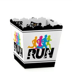 a paper box with the word run printed on it and people running in different colors