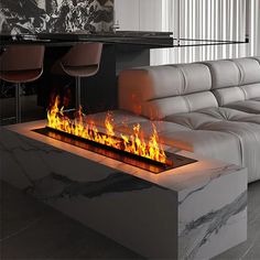 a modern fireplace in the middle of a living room