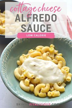 a bowl filled with pasta and sauce on top of a table