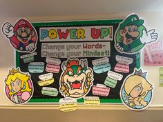 the power up bulletin board is decorated with cartoon characters