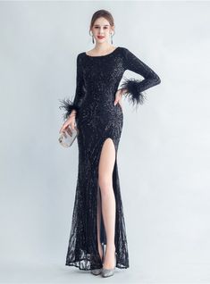 Delve into the essence of the night draped in this celestial mermaid silhouette dress. The scoop neckline is a soft invitation to a realm of elegance, followed by a cascade of sequins that shimmer with the gentle glow of the night. The long sleeves, adorned with feather embellishments at the wrists, are a whisper of wild elegance, adding a touch of the ethereal. The high slit is a nod to the daring, a playful tease amidst the gentle, promising a night of unforgettable adventures. This dress isn't just a dress; it's a promise of a night filled with tales of elegance and whimsical charm. Backless Party Dress, Bold Statement Jewelry, Green Sequins, Wedding Dress Shopping, Dress Silhouette, Stunning Dresses, Long Maxi Dress, Long Sleeve Maxi Dress, Dress First