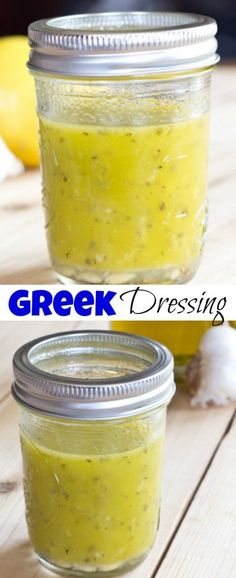 two jars filled with green dressing sitting on top of a wooden table next to lemons