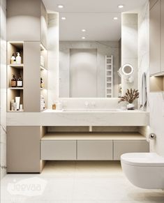 a bathroom with a white toilet sitting next to a sink and a mirror above it