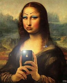 a woman holding a cell phone in her hand and looking at the screen with an evil look on her face