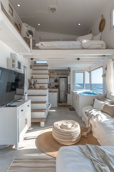 a living room filled with furniture and a flat screen tv