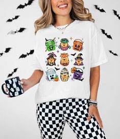 This tee is comfy, cozy and the perfect addition to your Halloween merch collection! With each wash these shirts get softer! If you want an oversized look, Size up - Tees are unisex. Design is DTF TRANSFERED onto product. Instructions will be included with every order. Fall White T-shirt For Loungewear, Oversized White T-shirt For Halloween, Casual T-shirt With Character Print For Loungewear, Casual Character Print T-shirt For Loungewear, White T-shirt With Character Print For Fall, White Character Print T-shirt For Fall, White Cartoon Print T-shirt For Loungewear, Halloween Nuggets, Halloween Merch