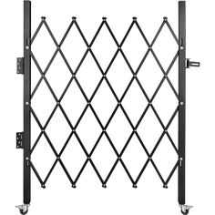 a metal gate with wheels on it