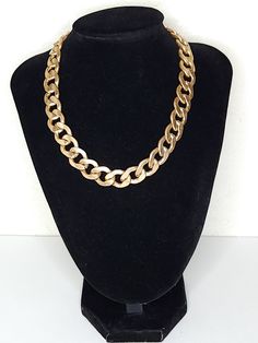 ITEM DESCRIPTION This is a vintage gold tone chain necklace.  It is a chunky curb chain style. See all photos please...they are part of the description. Markings/Stamps:  Unmarked MEASUREMENTS: 19 Inches Found in photos - please review all photos  **Due to age, there may be a small amount of age flaws not deemed to be worthy of noting...straw marks, bubbles, some scuffing, some particles...as typical with age/production.  I will be glad to provide any additional info/pics if requested.  PLEASE R Retro Gold Metal Chain Necklace, Retro Gold Chain Necklace, Vintage Gold Curb Chain Necklace, Costume Jewelry Chain Necklace With Chunky Chain Link, Chunky Chain Link Necklace In Costume Jewelry, Chunky Chain Link Necklace Costume Jewelry, Vintage Chunky Gold Necklace, Vintage Gold-tone Chain Link Necklace, Vintage Chain Link Necklace For Party