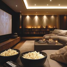 Luxurious private home theater with plush sofa, candlelit ambiance, and popcorn bowls. Ideal for a cozy movie night at home. Luxurious Home Theater, Cinema Room Design, Cozy Sectional, Cozy Candlelight, Cute Living Room, Home Cinema Room, At Home Movie Theater, Furniture Details Design, Private Home