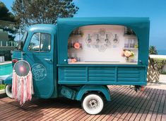 an ice cream truck parked next to a swimming pool