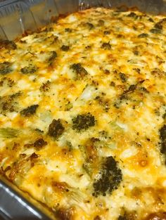 a casserole dish with broccoli and cheese on it in a pan